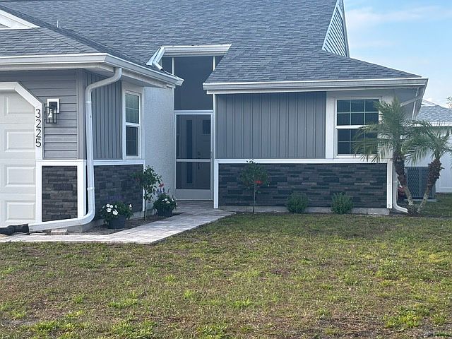 Front entrance screened in entry