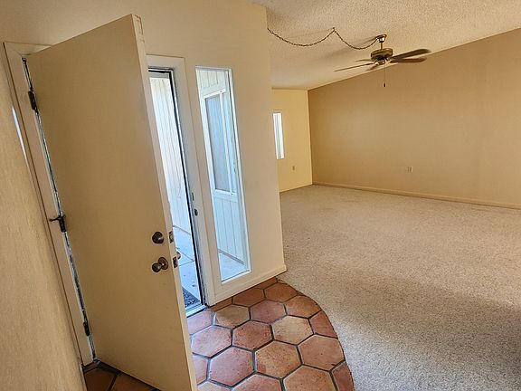 View after entering front door looking into large living room