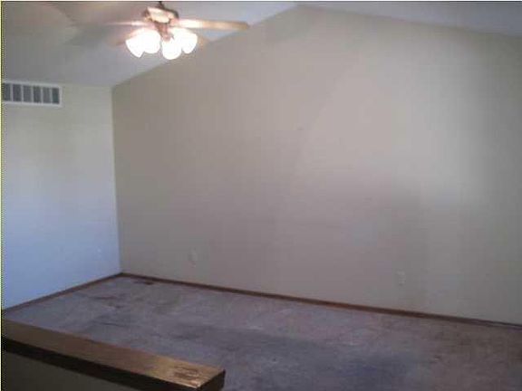 Upstairs Living room with vaulted ceiling