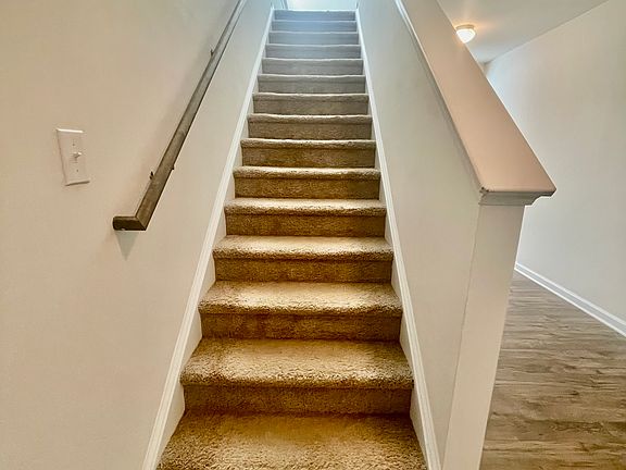 Stairs from foyer to upstairs