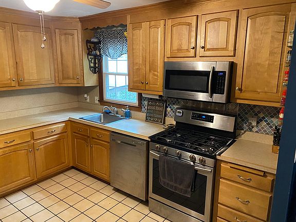large kitchen open to dining area, most new appliances