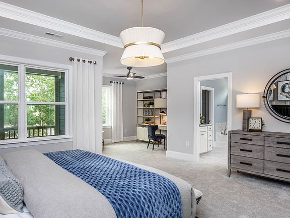 Owner s retreat with sitting room and covered deck