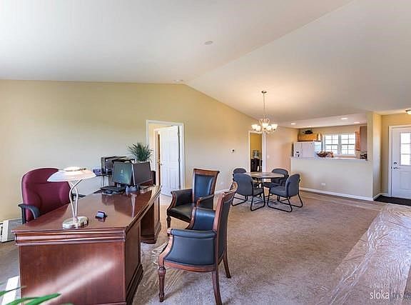 Picture shown is when we used as our former sales office. This is living/dining room.