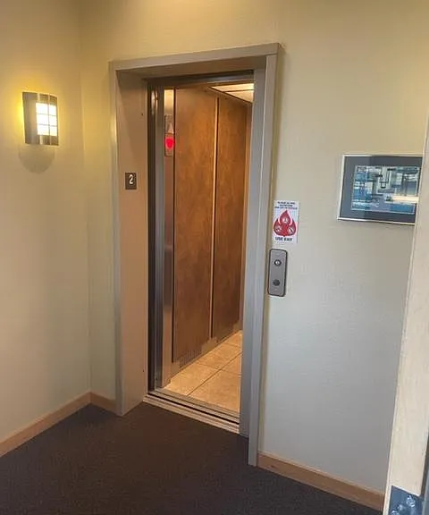 Elevator to second floor where condo is