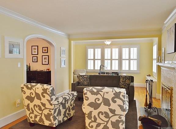 The formal living room has ...