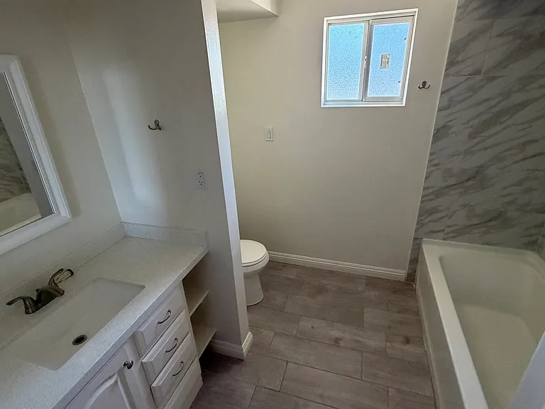 Primary bedroom attached private bathroom