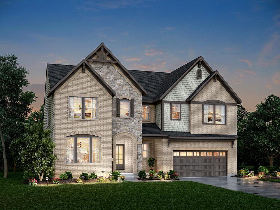 new home with brick, stone and shakes