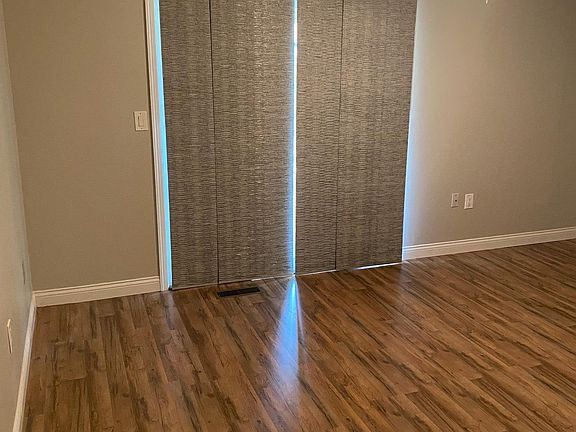 back family room with sliding door to backyard