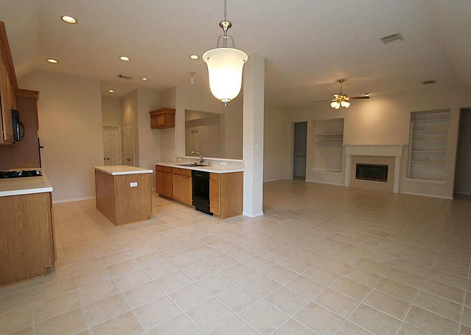kitchen opens to family room.