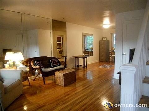 View of living room/dining room from front door