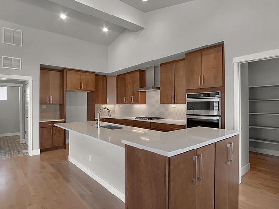 Walk-in Pantry Photo representing home to be built and may demonstrate optional features