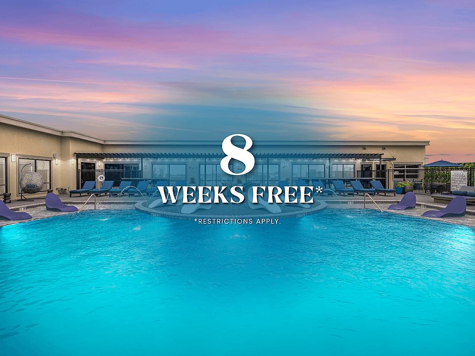 Rooftop Pool - Resort-style pool with sun shelf, cabanas and grills for relaxing and entertaining close to home.