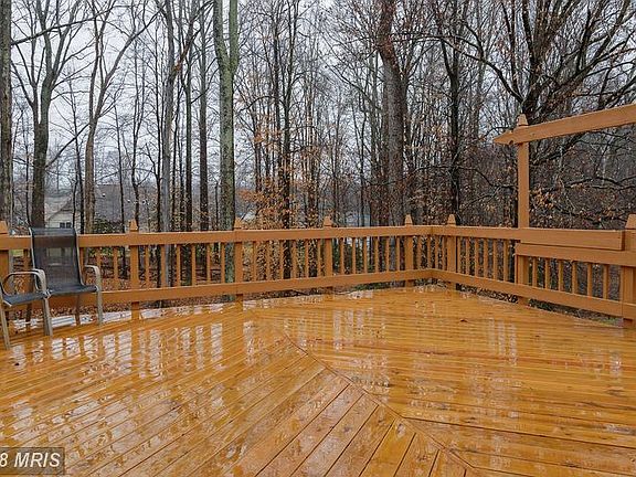 Enormous Deck facing treed level yard