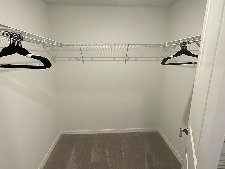 Master bedroom walk in closet