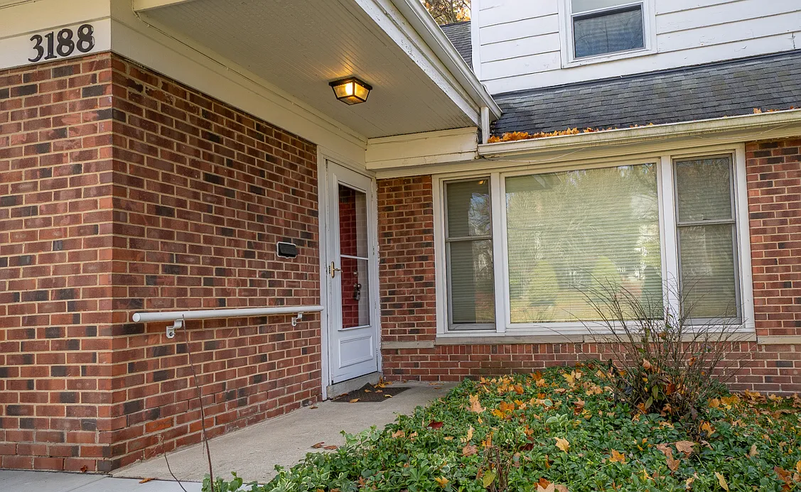 Front door and huge picture window. Nice blinds on these windows. - 3188 Monmouth Rd #3188