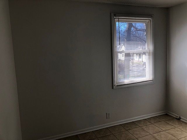 Bedroom 2 with adjoining bathroom.