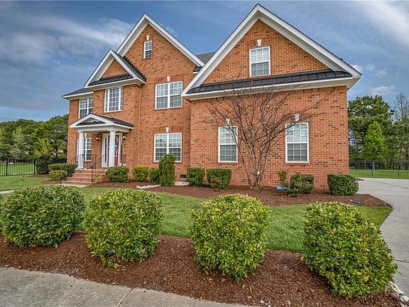 Side load garage with wide driveway and 2 car side load garage.
