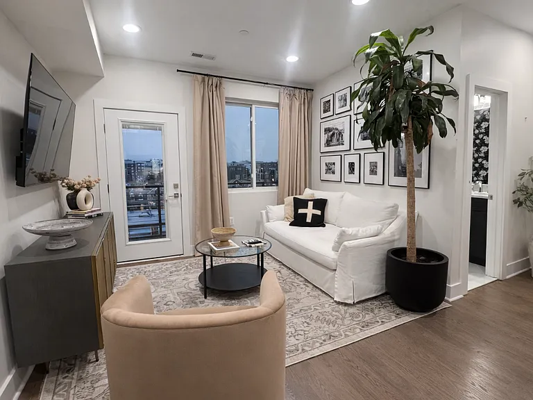 Cozy living room with a small balcony
