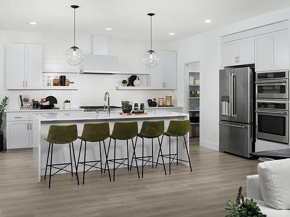 Kitchen with floating shelves and pendant lighting
