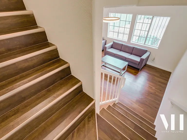 Apt A-E | 3 Bed 2.5 Bath | Half bath on first floor. Hardwood throughout, deck/balcony on 1st floor, private balcony in largest bedroom on second floor. All Stainless appliances, tons of windows, large bedrooms, tons of storage, internet included!