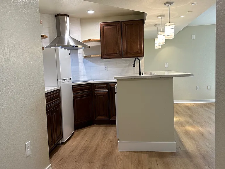 View of the kitchen and main room from the north bedroom.