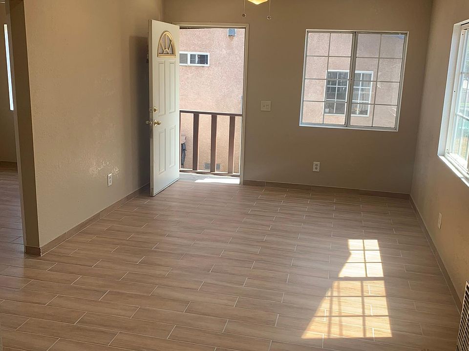 Six receding lights and a ceiling fan in the living room/dinning area.
