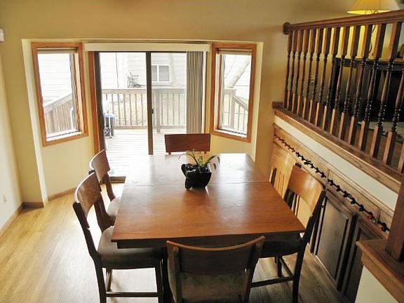 Dining area with patio door to decks