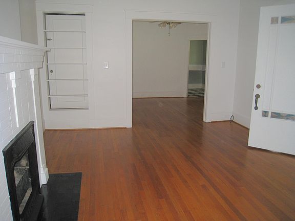 Entry into LR ( with FP) from Screened Porch. View of DR from LR....