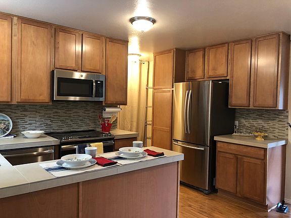 New Stainless Steel Range, Microwave, Dishwasher and Counter
