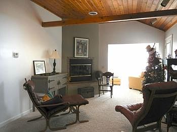 Living room to enjoy with skylight & gas fireplace