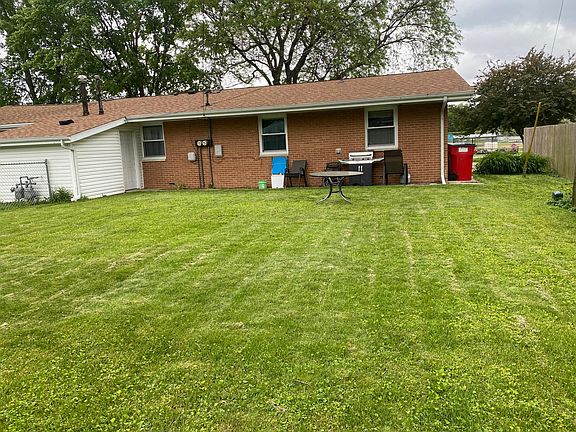 The backyard is large and the landlord is willing to negotiate with the cost of a small chain link fence to near the side door to keep the dog in.
