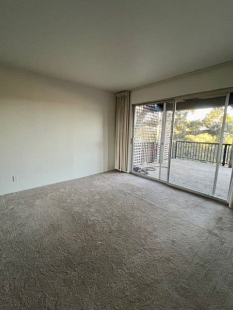 Primary Bedroom with separate entrance to balcony,