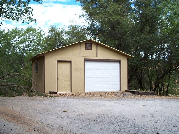 detached garage with small shop
