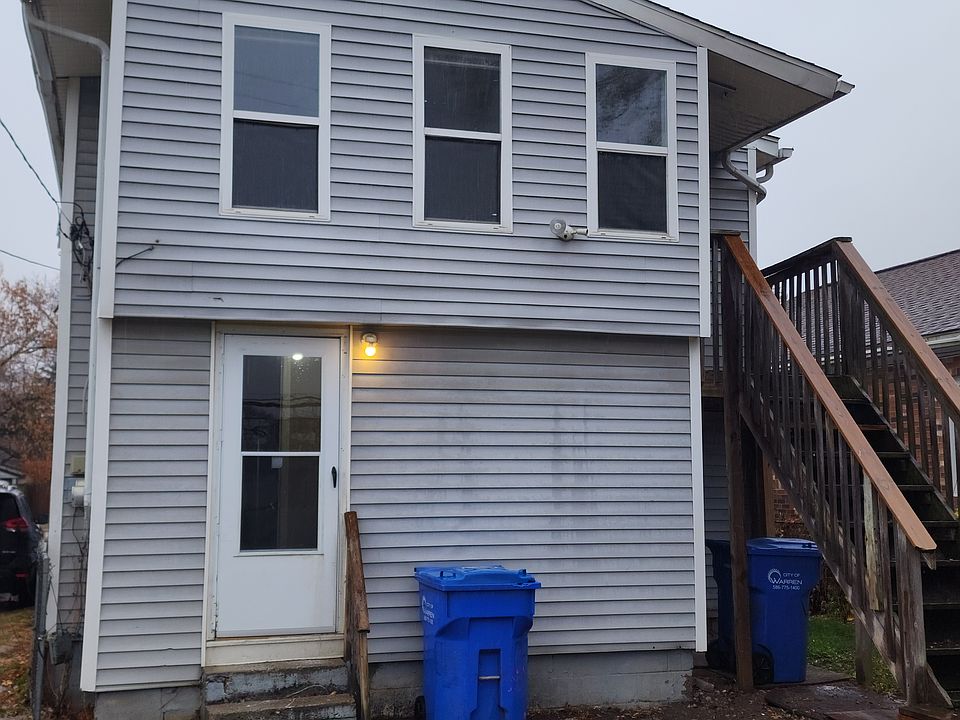 Rear view of the house with large backyard to enjoy in the summer