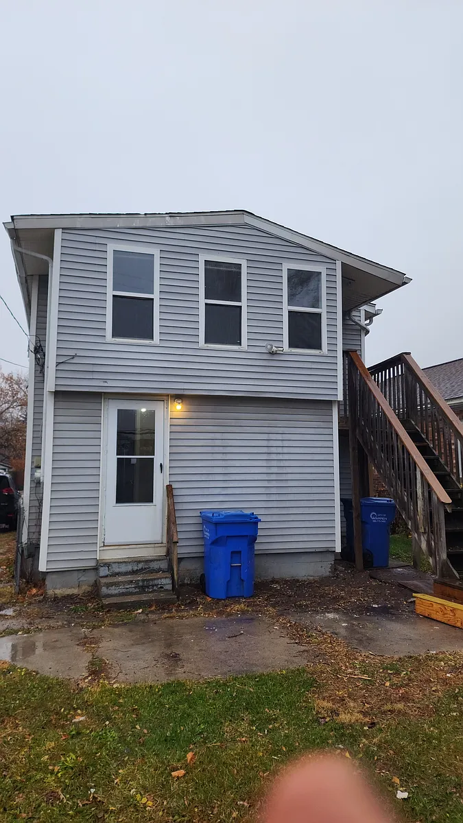 Rear view of the house with large backyard to enjoy in the summer - 23156 Bolam Ave #2