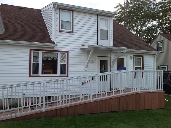 Back of house w/wheelchair ramp