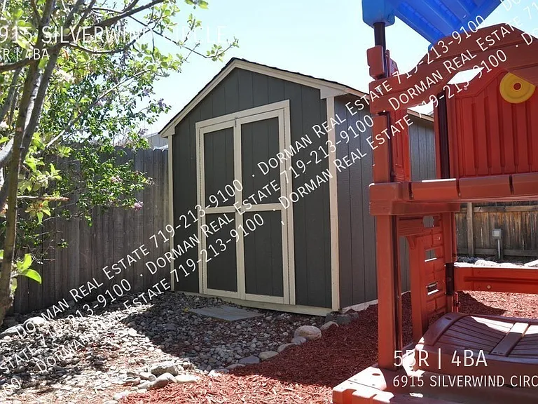 6915 Silverwind Cir — Photo 32
