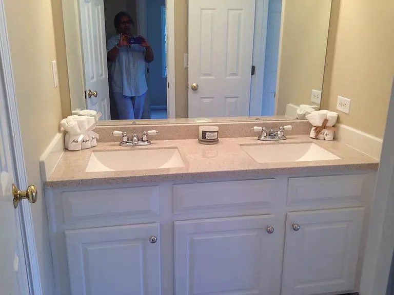 Secondary bathroom..double vanity & sinks