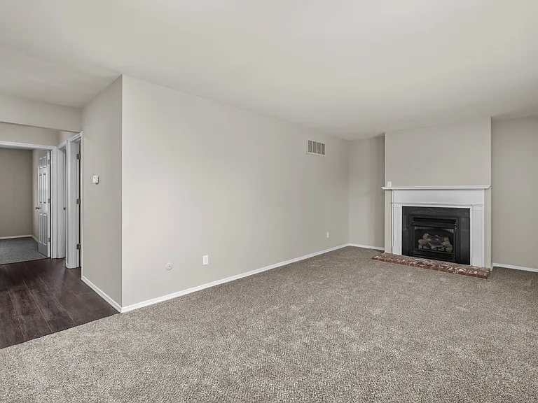 Two Bedroom Garden Remodel with Fireplace | Living & Dining Space Two Bedroom Garden Remodel with Fireplace | Living & Dining Space