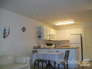 LIVING INTO DINING-KITCHEN