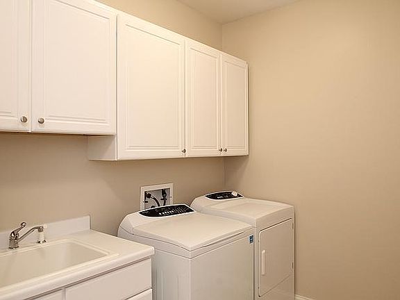 Laundry Room on first floor complete with utility sink and double closet on the right (not in photo).