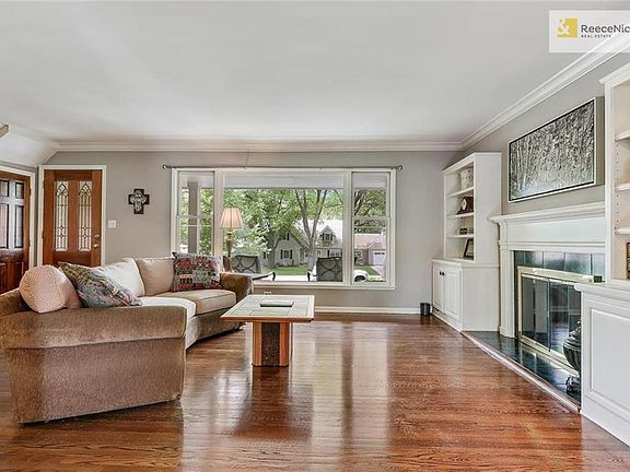 Gleaming hardwood floors and large windows bring the outdoors in.