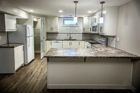 Building Photo - 5904 97a Ave NW #1A