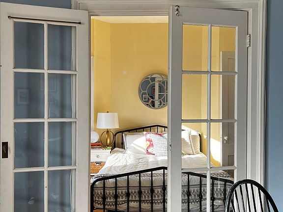 Looking into the bedroom from the dining room.