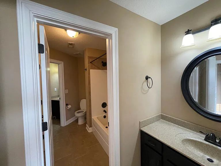 Upstairs Jack and Jill Bath. Each bedroom has individual sink and vanity space.