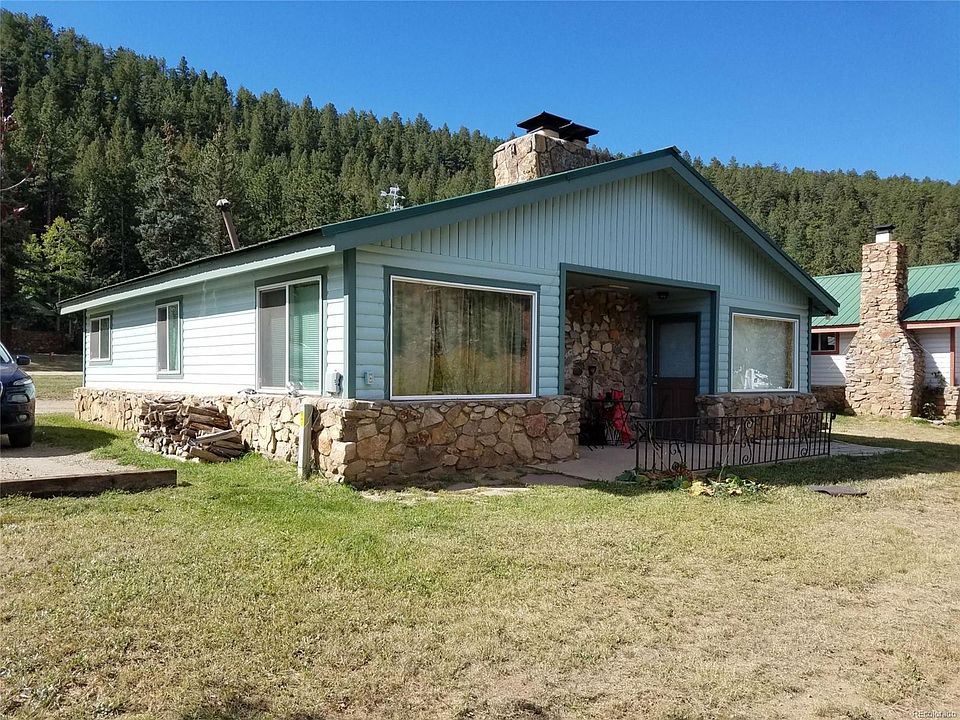 Exterior of building - sits on community pond.