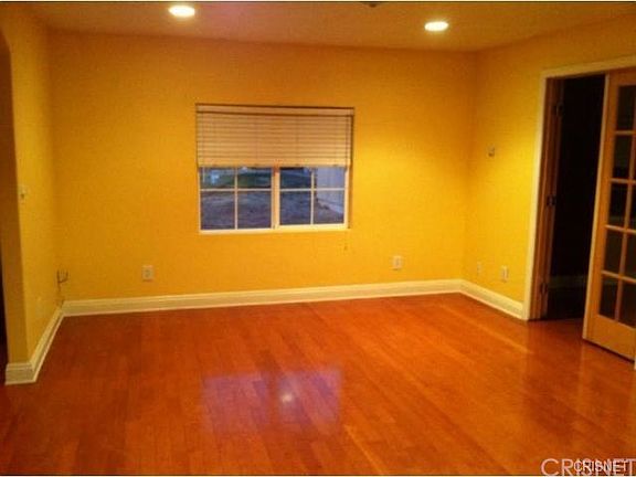 Living Room area with doors to the bedrooms.