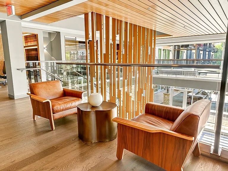 Settle into this cozy corner of the sky lounge for casual chats or solo downtime with a view.