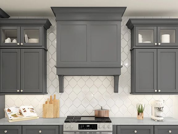 Kitchen with hexagonal tile backsplash