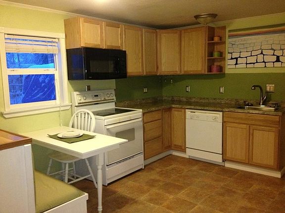 Kitchen with dining nook and plenty of storage
